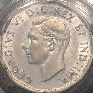 Silver Coin with Profile Design